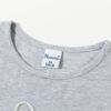 Camiseta corta flor con perlitas